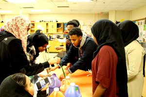 Seniors Iqlas Ibrahim (left), and (right) Anas Farah, the president of the Muslim Student Association (MSA) help along with other MSA students to create a poster for the African Culture night event held at South High. The African Culture night will be on Thursday, March 30th from 5-8 PM. There will be music, food and a sharing of culture at this event. MSA is the only group we currently have at South that is faith based. The opportunities provided by MSA for their members to work together on projects such as the poster provide further time to bond.