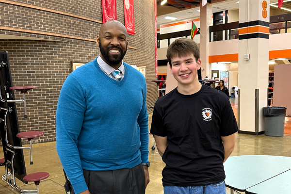 Mr Maxey and Maxwell Nibblett, a staff member and student both participating in the game.